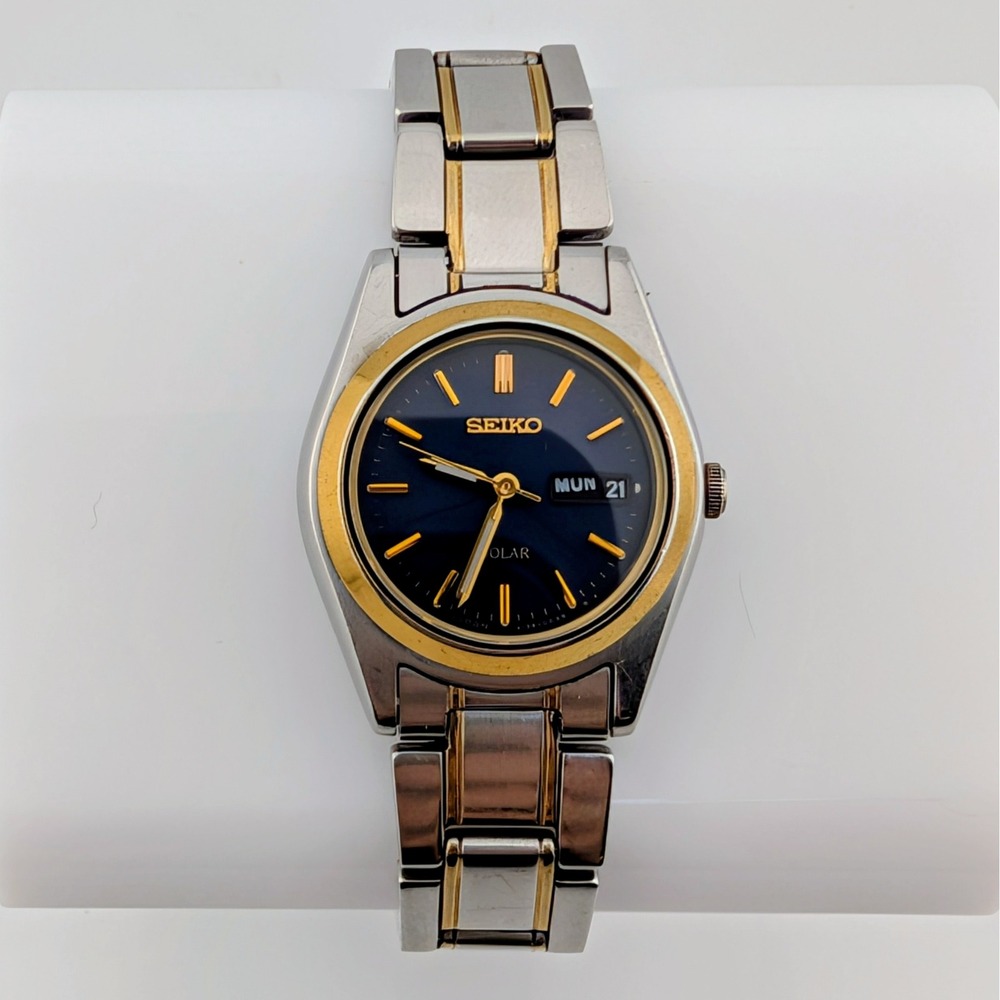 Seiko Solar V138-0AA0 Blue Sunburst Day/Date Two Tone Women's 25mm Watch
